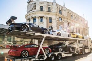 6 Porsche 911s and a trailer truck up for auction - © RM Sotheby’s